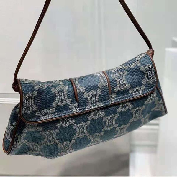 2021 new antique armpit niche design denim middle ancient french stick single shoulder half moon bag
2021 new antique armpit niche design denim middle ancient french stick single shoulder half moon bag