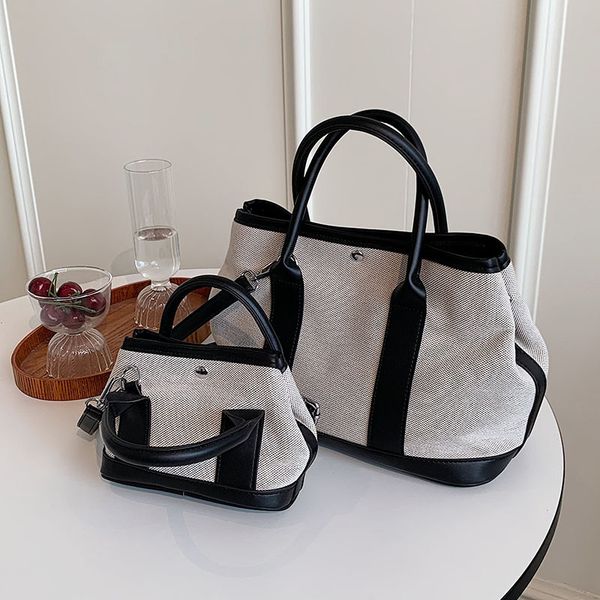 design handbag bags garden female 2021 new japanese and korean mommy canvas bag leisure portable high-grade one shoulder messenger bag k67p
design handbag bags garden female 2021 new japanese and korean mommy canvas bag leisure portable high-grade one shoulder messenger bag k67p