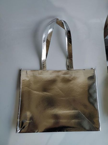 gift wrap 100pcs/lot big size reusable fashtion sliver metallic bags with handle non woven for store shopping and package
gift wrap 100pcs/lot big size reusable fashtion sliver metallic bags with handle non woven for store shopping and package