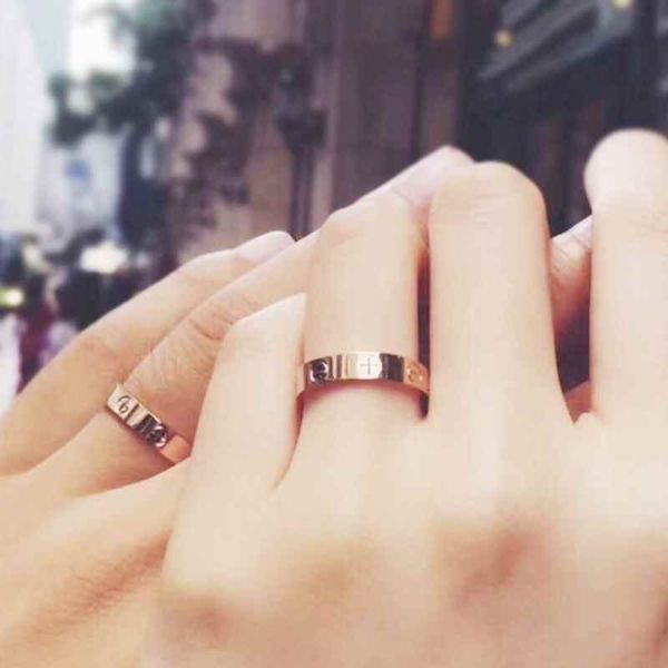 high polished designer lover ring logo printed classic style men rings gold silver rose colors stainless steel women jewelry wholesale
high polished designer lover ring logo printed classic style men rings gold silver rose colors stainless steel women jewelry wholesale