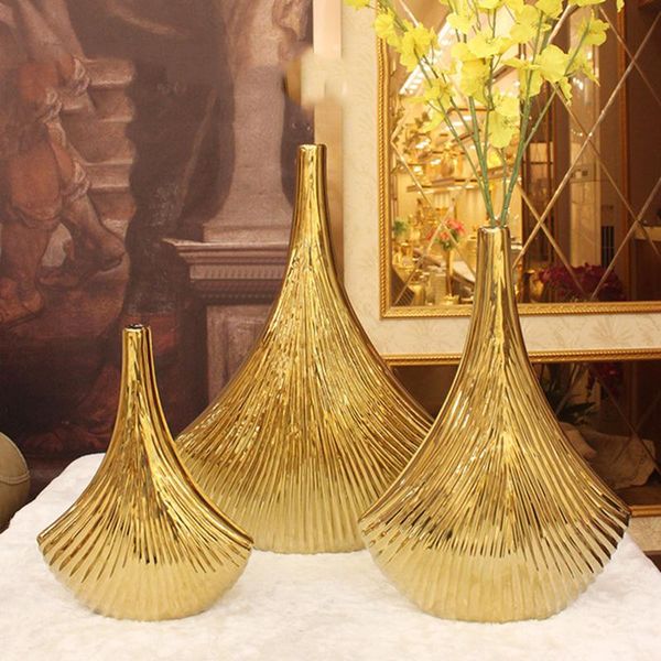 vases modern ins nordic ceramic shell origami cylinder golden luxury electroplating pure gold crafts ornaments wedding vase
vases modern ins nordic ceramic shell origami cylinder golden luxury electroplating pure gold crafts ornaments wedding vase