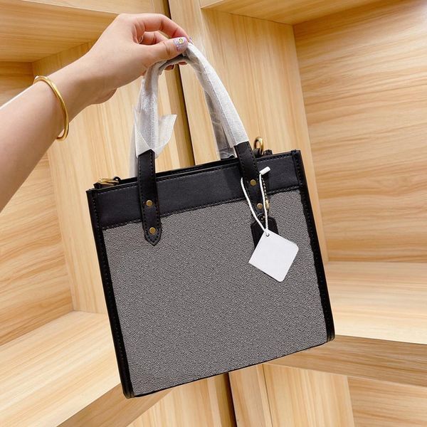 small tote shopping bag handbag wide shoulder strap crossbody bags genuine leather carriage pattern c letter founder modeling
small tote shopping bag handbag wide shoulder strap crossbody bags genuine leather carriage pattern c letter founder modeling