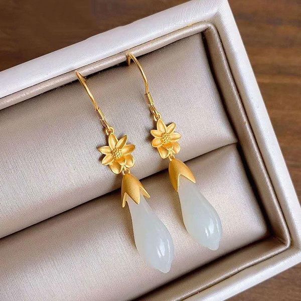 silver inlaid natural hetian white magnolia earrings chinese style retro unique ancient gold craft charm women's brand jewelry
silver inlaid natural hetian white magnolia earrings chinese style retro unique ancient gold craft charm women's brand jewelry