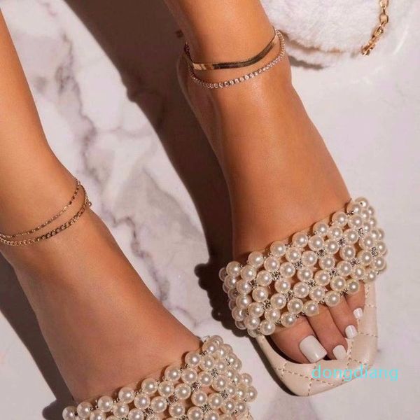 luxurys designers women pearl beach shoes flat woman sandals string bead summer shoes lady fashion slippers, Black
luxurys designers women pearl beach shoes flat woman sandals string bead summer shoes lady fashion slippers, Black