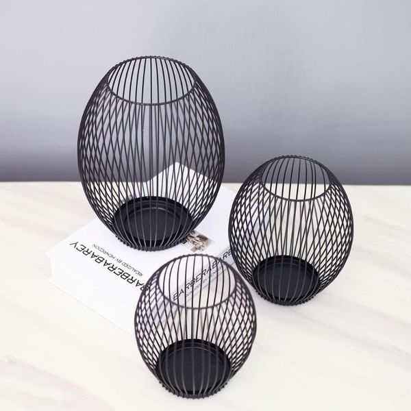 candle holders modern nordic style wrought iron hollow out geometric structure black lantern holder luxury home party decoration
candle holders modern nordic style wrought iron hollow out geometric structure black lantern holder luxury home party decoration