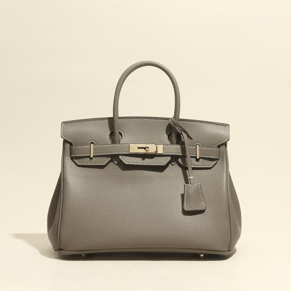 design hand 2021 summer new style litchi grain leather high capacity messenger women's bag b7o0
design hand 2021 summer new style litchi grain leather high capacity messenger women's bag b7o0