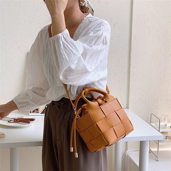 korean women's fashion draw belt pleated hand trend messenger single shoulder design woven small round bag
korean women's fashion draw belt pleated hand trend messenger single shoulder design woven small round bag