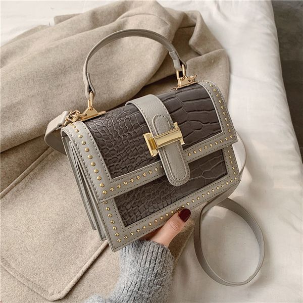 handbag rivet lady's solid small square bag magnetic buckle pu single shoulder, Black;red
handbag rivet lady's solid small square bag magnetic buckle pu single shoulder, Black;red