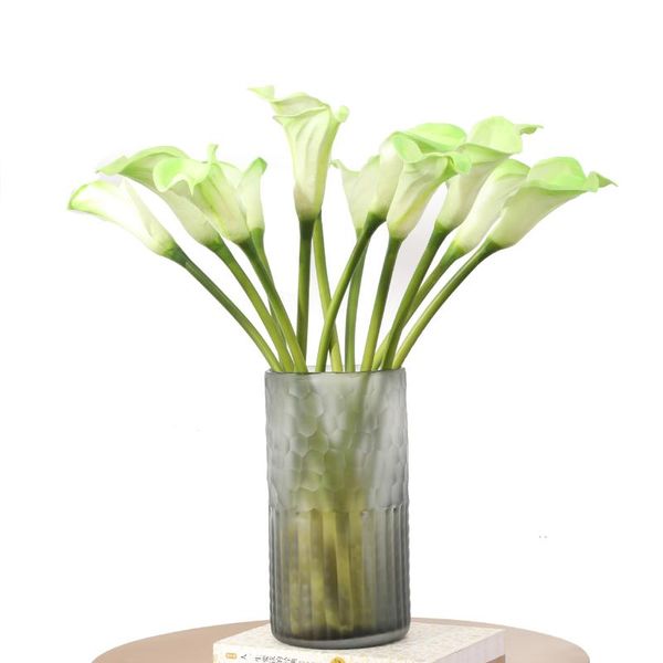 10 pc simulation small calla lily pu artificial flowers for home decoration accessories wedding background fake flower lilies
10 pc simulation small calla lily pu artificial flowers for home decoration accessories wedding background fake flower lilies