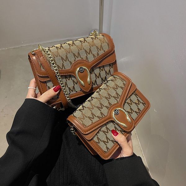 printed bag women's 2021 fashion niche color contrast single shoulder net red chain messenger small square
printed bag women's 2021 fashion niche color contrast single shoulder net red chain messenger small square