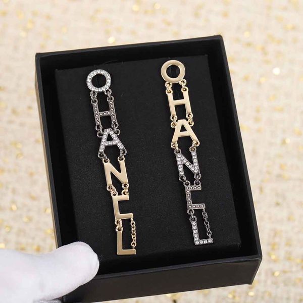 letters with diamond drop earring in gold plated and black color for women engagement jewelry gift with box ps4006, Golden 
letters with diamond drop earring in gold plated and black color for women engagement jewelry gift with box ps4006, Golden