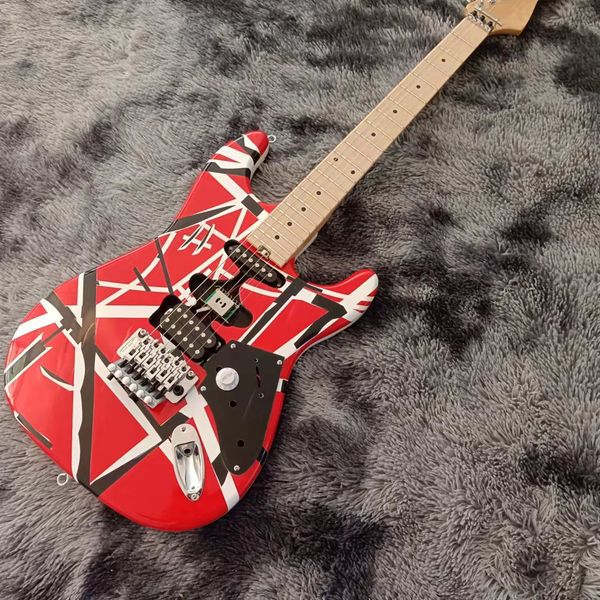 striped custom art series chavell black red white black electric guitar with open type zebra pickups maple fretboard
striped custom art series chavell black red white black electric guitar with open type zebra pickups maple fretboard