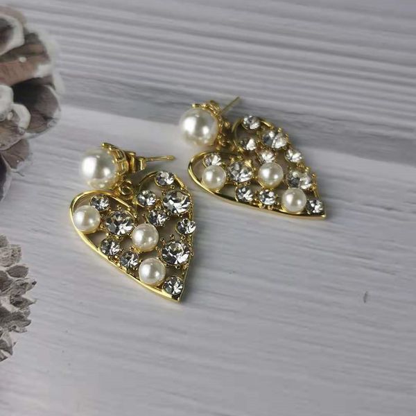 special offer 70% off new heart-shaped pearl earrings french advanced fashionable temperament love full diamond hollow, Golden;silver
special offer 70% off new heart-shaped pearl earrings french advanced fashionable temperament love full diamond hollow, Golden;silver