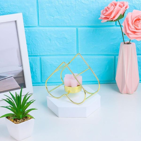 candle holders retro candlestick three-legged heart shaped geometric metal wrought iron holder home decoration
candle holders retro candlestick three-legged heart shaped geometric metal wrought iron holder home decoration