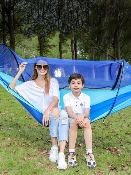 tents and shelters camping hammock with mosquito net portable outdoor parachute swing sleeping supplies
tents and shelters camping hammock with mosquito net portable outdoor parachute swing sleeping supplies