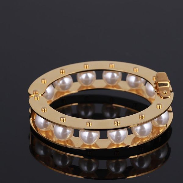 bangle 2021 europe and the united states trend jewelry hollow imitation pearl gold glossy fashion woman's bracelet, Black
bangle 2021 europe and the united states trend jewelry hollow imitation pearl gold glossy fashion woman's bracelet, Black