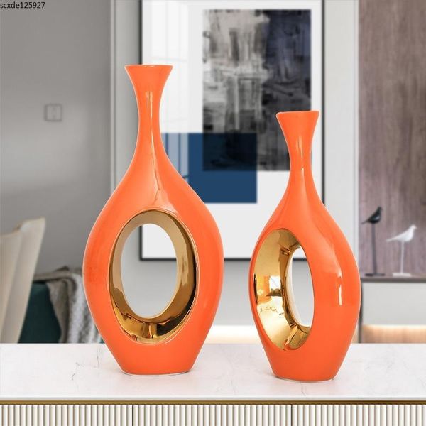 vases creative orange ceramic hollow vase flower arrangement plant pot electroplating porcelain crafts entrance decoration
vases creative orange ceramic hollow vase flower arrangement plant pot electroplating porcelain crafts entrance decoration