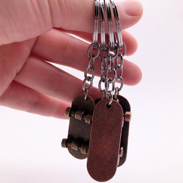 keychains european and american retro fashion metal elements skateboard key chain men women's car backpack accessories, Silver
keychains european and american retro fashion metal elements skateboard key chain men women's car backpack accessories, Silver