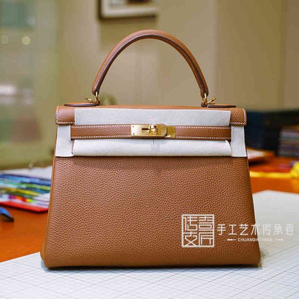 designer handbags 2021 handmade kellys bag togo leather litchi pattern golden brown kl25cm gold buckle single shoulder messenger bag bb
designer handbags 2021 handmade kellys bag togo leather litchi pattern golden brown kl25cm gold buckle single shoulder messenger bag bb