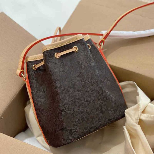 women sling drawstring bucket bag mini brown old flower crossbody handbag chameleon skin leather wallet high quality
women sling drawstring bucket bag mini brown old flower crossbody handbag chameleon skin leather wallet high quality