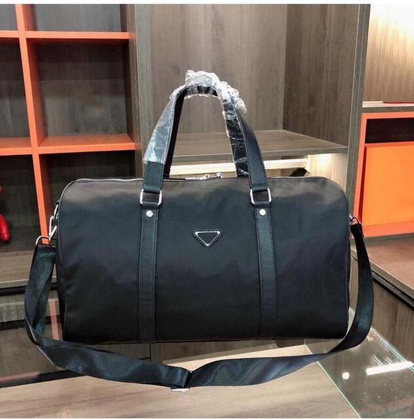 54cm large capacity women men travel bags famous classical new men shoulder designer duffel bags carry on luggage
54cm large capacity women men travel bags famous classical new men shoulder designer duffel bags carry on luggage
