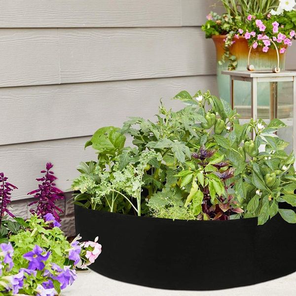 fabric raised garden bed 50 gallons round planting container grow bags breathable felt fabric planter pot for plants nursery pot
fabric raised garden bed 50 gallons round planting container grow bags breathable felt fabric planter pot for plants nursery pot