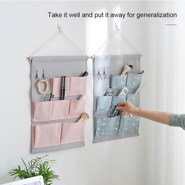 storage bags 7 pocket hanging sundries organizer with hook wardrobe closet bag door wall bed mounted cosmetic hanger pouch
storage bags 7 pocket hanging sundries organizer with hook wardrobe closet bag door wall bed mounted cosmetic hanger pouch