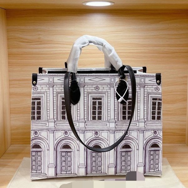 womens luxurys designers bags mm architettura tote black white fornasetti business handbag leather shoulder bags italian bag on the go
womens luxurys designers bags mm architettura tote black white fornasetti business handbag leather shoulder bags italian bag on the go