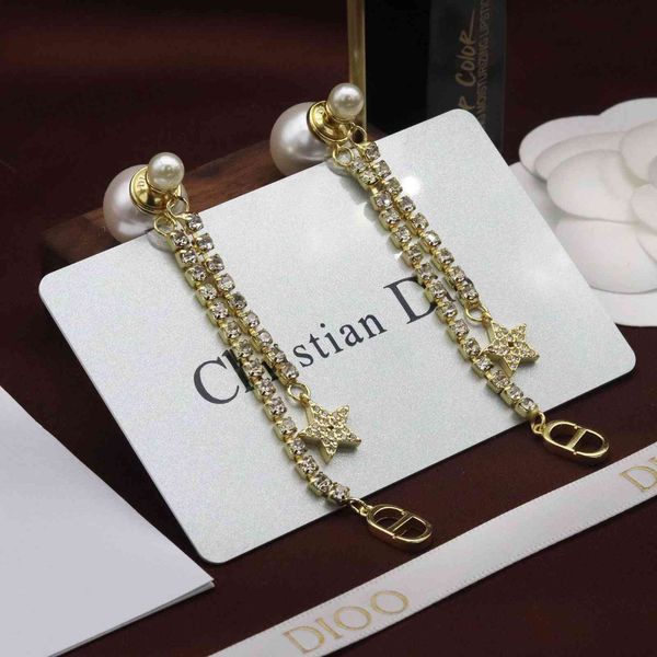 d family's new light gold cd letter long diamond tassel earrings in 2021, Golden
d family's new light gold cd letter long diamond tassel earrings in 2021, Golden