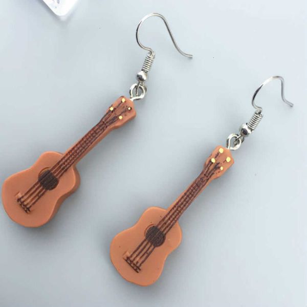 music fashion instrument guitar earrings women drop dangle earring diy ornament handmade jewelry, Golden
music fashion instrument guitar earrings women drop dangle earring diy ornament handmade jewelry, Golden