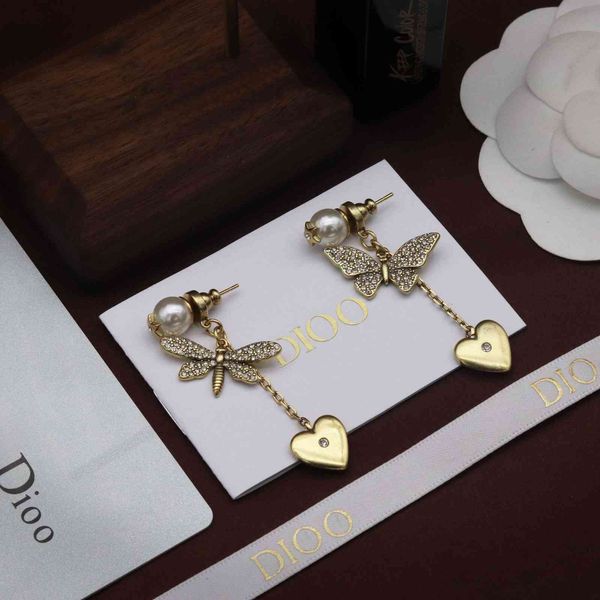 2021 new designer new family butterfly asymmetric earrings in 2021 red water dragonfly love, Golden
2021 new designer new family butterfly asymmetric earrings in 2021 red water dragonfly love, Golden