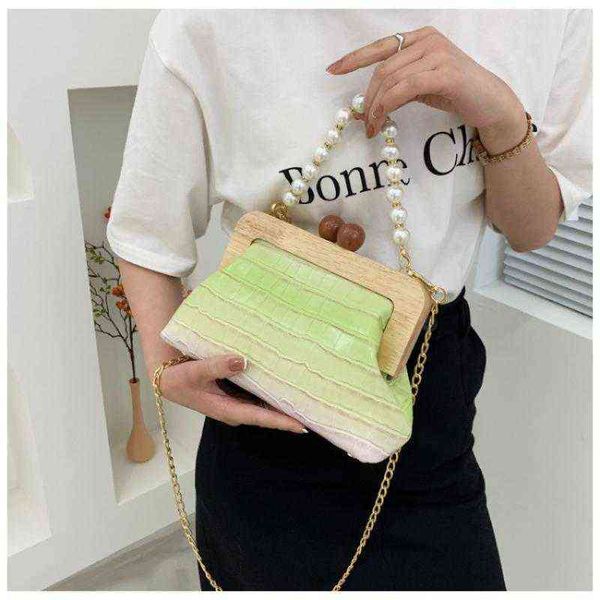 shopping bags summer pearl handbags for women retro chain shoulder crossbody ladies fashion wood clip shell purses shopper 220303
shopping bags summer pearl handbags for women retro chain shoulder crossbody ladies fashion wood clip shell purses shopper 220303