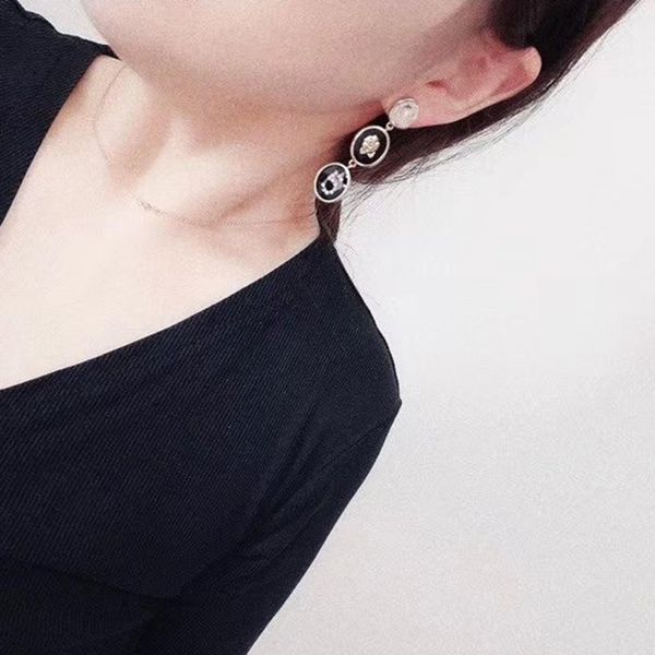 c2371 glisten new design earrings with stylish camellias letters tassel earrings crystal white zircon jewelry, Golden;silver
c2371 glisten new design earrings with stylish camellias letters tassel earrings crystal white zircon jewelry, Golden;silver