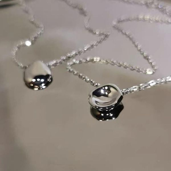 pendant necklaces origin summer minimalist irregular circle silver color metallic necklace for women statement wedding jewellery
pendant necklaces origin summer minimalist irregular circle silver color metallic necklace for women statement wedding jewellery