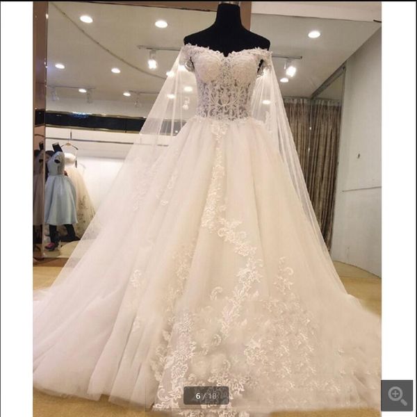 2021 real p white tulle ball gown wedding dress off the shoulder lace appliques with cape luxury bride dresses princess puffy beading corset
2021 real p white tulle ball gown wedding dress off the shoulder lace appliques with cape luxury bride dresses princess puffy beading corset