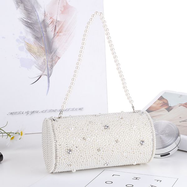 new cylindrical pearls stereo party bag handmade horizontal pearl bucket single shoulder messenger hand held evening bags
new cylindrical pearls stereo party bag handmade horizontal pearl bucket single shoulder messenger hand held evening bags
