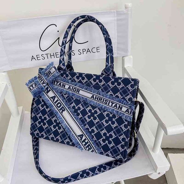 bag women's 2021 fashion net red canvas large capacity shoulder bag korean style foreign printing portable messenger, Black;red 
bag women's 2021 fashion net red canvas large capacity shoulder bag korean style foreign printing portable messenger, Black;red