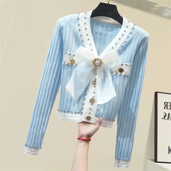 autumn arrival fashion women v-neck long sleeve luxury beading decoration knitting cardigan sweater female 211218, White;black
autumn arrival fashion women v-neck long sleeve luxury beading decoration knitting cardigan sweater female 211218, White;black