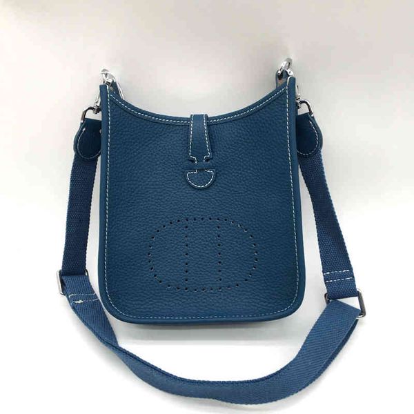 designer bagsleather messenger bag wide cloth shoulder strap head layer buckle leather evelyn h hollow fashion simple small shoulder bag 18c
designer bagsleather messenger bag wide cloth shoulder strap head layer buckle leather evelyn h hollow fashion simple small shoulder bag 18c