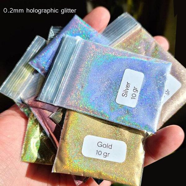nail glitter 10 g/bag 0.2mm 26color holographic ultra-fine iridescent rainbow glitters powder for 3d nail/body/eye craft, Silver;gold
nail glitter 10 g/bag 0.2mm 26color holographic ultra-fine iridescent rainbow glitters powder for 3d nail/body/eye craft, Silver;gold