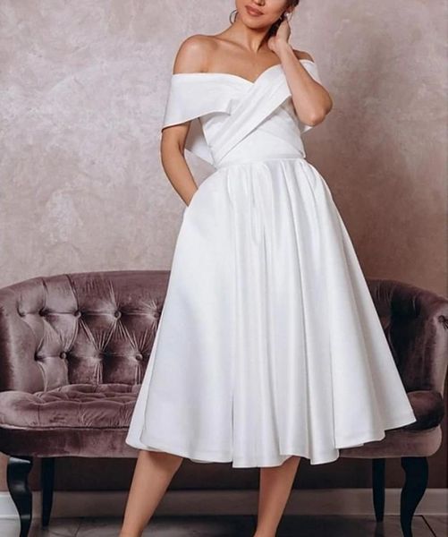 other wedding dresses a-line off shoulder tea length satin sleeveless vintage little white bridal gown 1950s with pleats 2021
other wedding dresses a-line off shoulder tea length satin sleeveless vintage little white bridal gown 1950s with pleats 2021