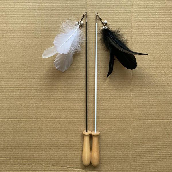 cat toys 2021 teaser feather bell sound toy solid wood handle pet products black and white
cat toys 2021 teaser feather bell sound toy solid wood handle pet products black and white