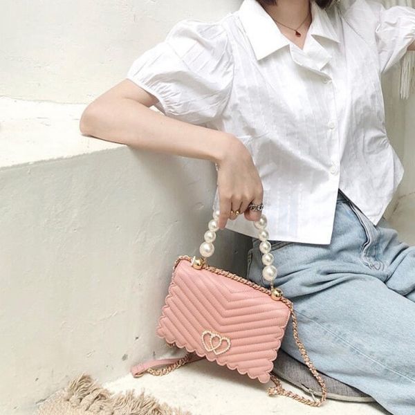 small female new 2021 messenger shoulder bag pearl chain trend version of the squid
small female new 2021 messenger shoulder bag pearl chain trend version of the squid
