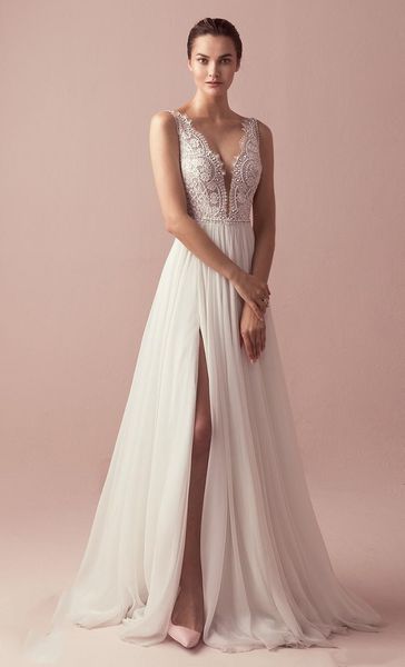 new 2021 boho lace aline wedding gowns v-neck beads elegant bride side slit robe de mariee fe66, White
new 2021 boho lace aline wedding gowns v-neck beads elegant bride side slit robe de mariee fe66, White
