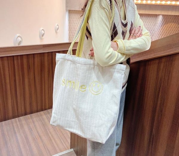 2021 spring and summer new fashion casual wild embroidery smiley face large capacity shoulder bag hair ball shoulder strap student class fem
2021 spring and summer new fashion casual wild embroidery smiley face large capacity shoulder bag hair ball shoulder strap student class fem