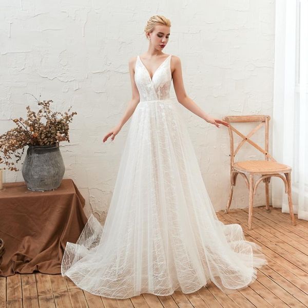 other wedding dresses wholesale charming ivory lace sleeveless bridal v neckline open back gowns for bride court train 2021, White
other wedding dresses wholesale charming ivory lace sleeveless bridal v neckline open back gowns for bride court train 2021, White