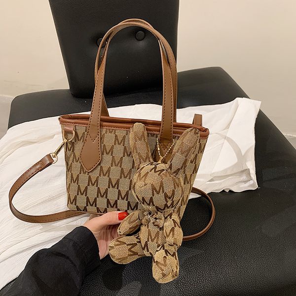 handbag portable rogue rabbit bag female summer 2021 fashion lattice tote ins letter foreign style messenger
handbag portable rogue rabbit bag female summer 2021 fashion lattice tote ins letter foreign style messenger