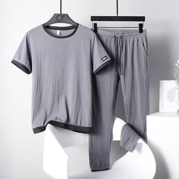 men's tracksuits suit / one piece summer ice silk extra large casual sports short sleeve t two leggings, Gray
men's tracksuits suit / one piece summer ice silk extra large casual sports short sleeve t two leggings, Gray