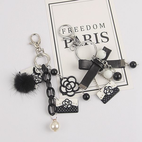 pearl camellia key rings keychain classic retro handmade black and white bag decorative pendant, Slivery;golden
pearl camellia key rings keychain classic retro handmade black and white bag decorative pendant, Slivery;golden