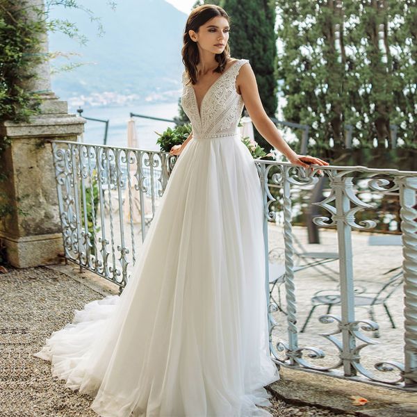 2022 wedding dress sleeveless v neck lace applique open back tulle a line wedding bridal gowns vestido de novia, White
2022 wedding dress sleeveless v neck lace applique open back tulle a line wedding bridal gowns vestido de novia, White